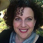 Linda Clemon-Karp wearing a blue scarf and black top